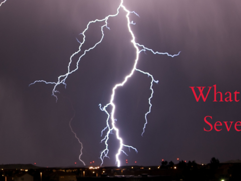 Lightning strike over houses